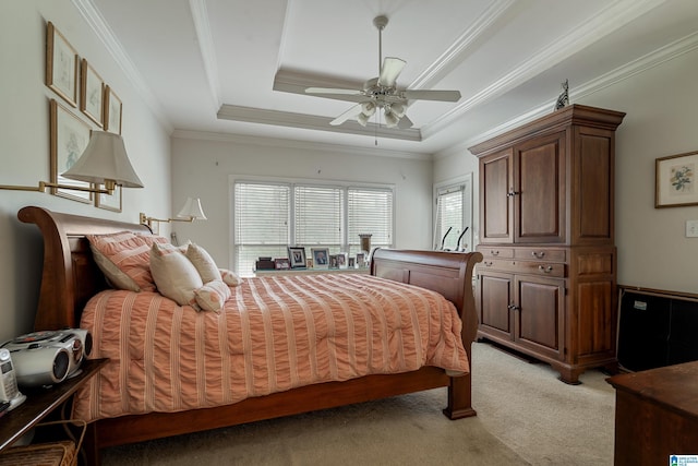 934 Chestnut Oaks Cir, Hoover, AL 35244 - bedroom with light colored carpet, a tray ceiling, crown molding, and a ceiling fan