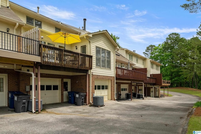 934 Chestnut Oaks Cir, Hoover, AL 35244 - view of property with central air condition unit and an attached garage