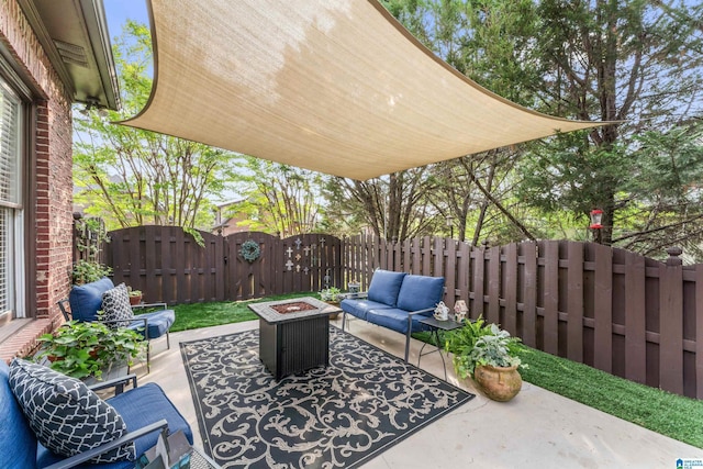 2608 Arbor Way, Hoover, AL 35244 - view of patio featuring an outdoor living space with a fire pit, a gate, and a fenced backyard