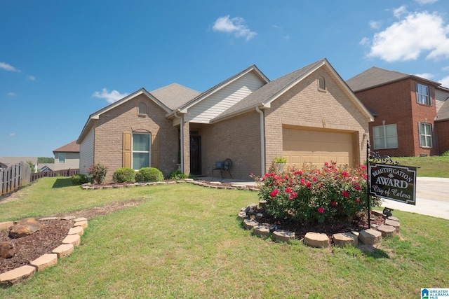 single story home with brick siding, fence, a garage, concrete driveway, and a front lawn