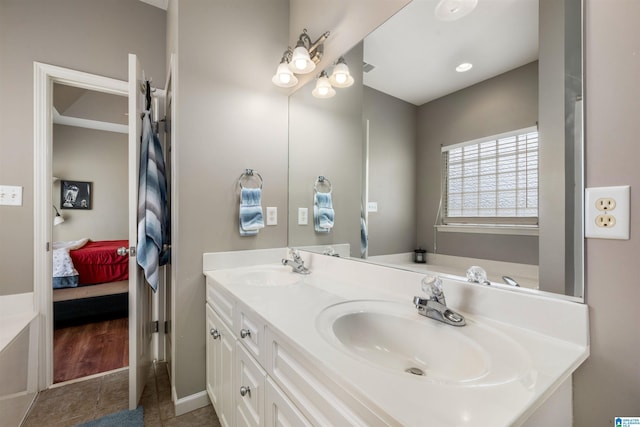 4126 Jubilee Ln, Moody, AL 35004 - bathroom featuring double vanity, connected bathroom, and tile patterned floors