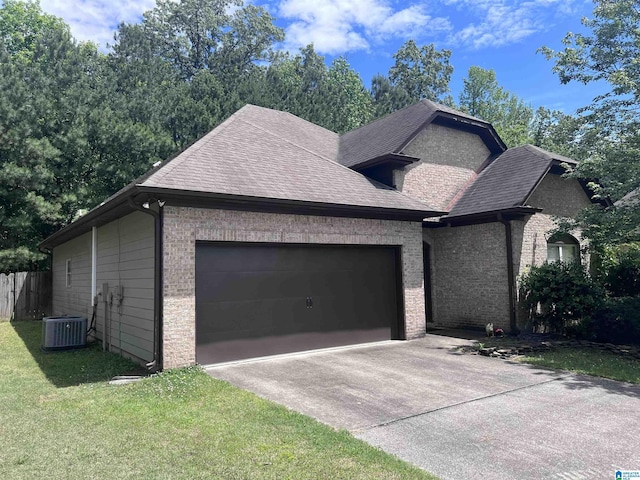 4126 Jubilee Ln, Moody, AL 35004 - view of front facade featuring an attached garage, brick siding, roof with shingles, concrete driveway, and central AC unit