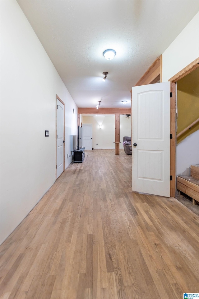 hallway with light wood-style flooring