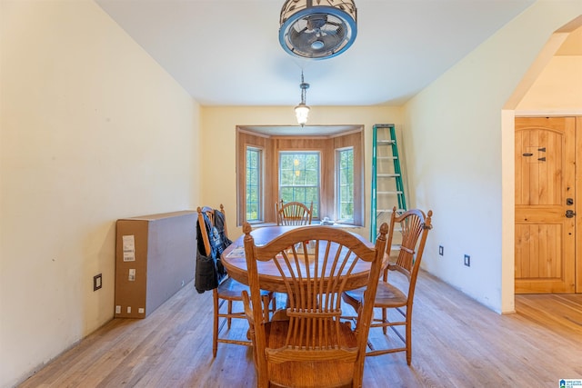 dining area featuring light wood finished floors