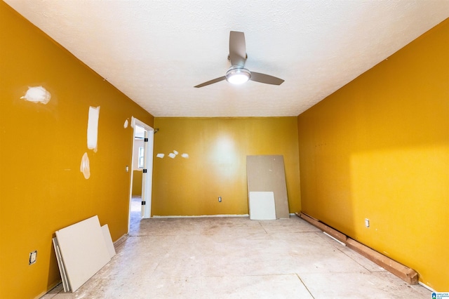 spare room with a ceiling fan