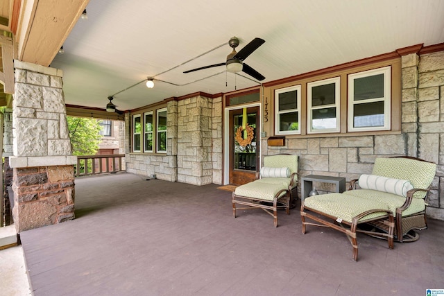 view of patio featuring a ceiling fan