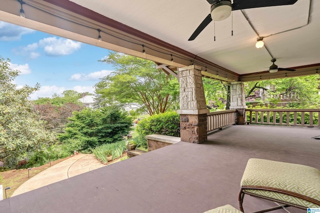 view of patio featuring ceiling fan and covered porch