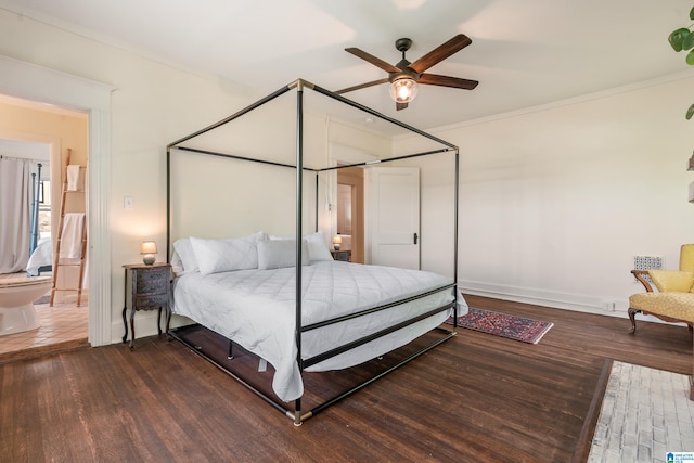 bedroom featuring wood finished floors, ornamental molding, baseboards, and a ceiling fan