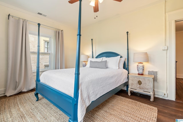 bedroom featuring wood finished floors and ceiling fan