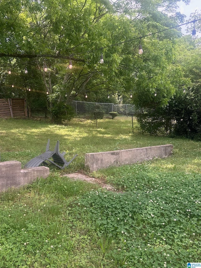 view of yard featuring fence