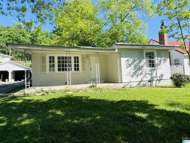 ranch-style home featuring a chimney, a front lawn, and crawl space