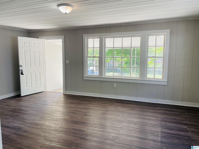 entrance foyer with baseboards and dark wood-style floors