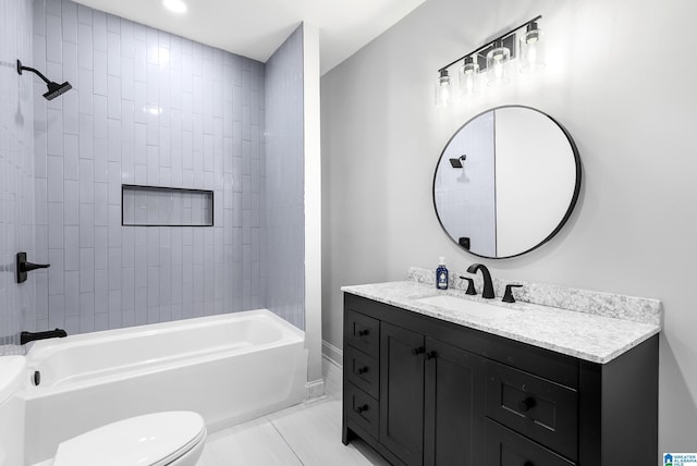 bathroom with toilet, bathing tub / shower combination, and vanity