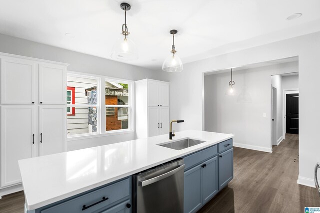 kitchen featuring dishwasher, a sink, light countertops, and white cabinets