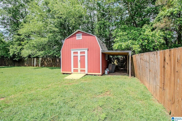 view of shed featuring a fenced backyard