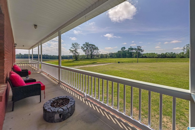 view of patio with an outdoor fire pit