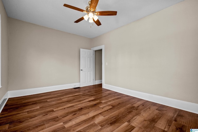 1330 Bush Blvd W, Birmingham, AL 35208 - unfurnished room featuring wood finished floors, a ceiling fan, and baseboards