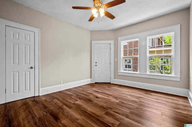 1330 Bush Blvd W, Birmingham, AL 35208 - unfurnished room with ceiling fan, wood finished floors, baseboards, and a textured ceiling