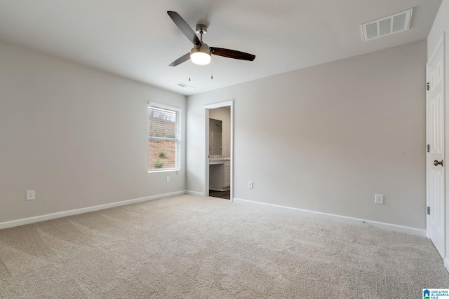 unfurnished bedroom featuring baseboards, visible vents, and carpet floors