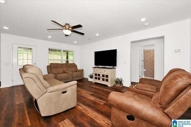 living room featuring ceiling fan, recessed lighting, and dark wood finished floors