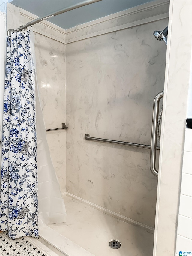 bathroom with a shower stall