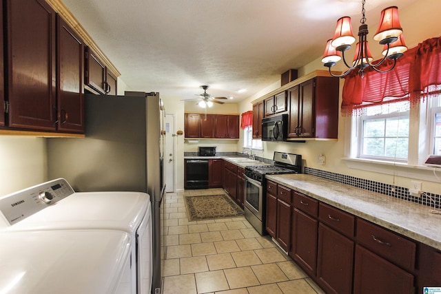 kitchen featuring washer and clothes dryer, decorative light fixtures, black appliances, light countertops, and light tile patterned floors