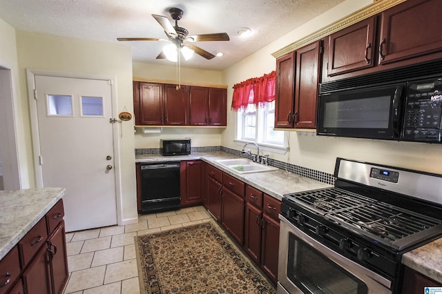 kitchen with a sink, black appliances, light countertops, a ceiling fan, and light tile patterned floors