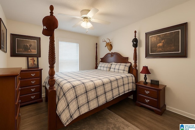 bedroom with dark wood-type flooring, baseboards, and a ceiling fan