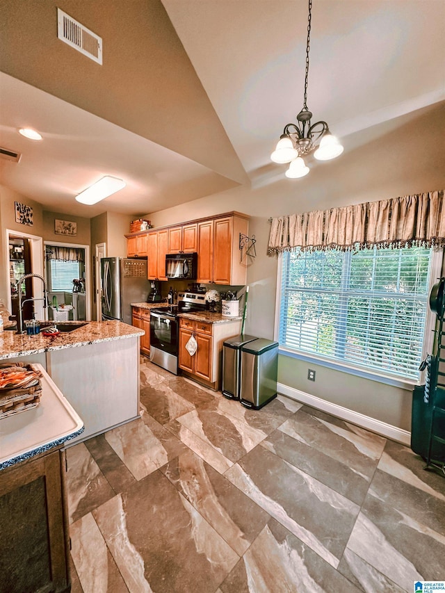 971 Old Cahaba Dr, Helena, AL 35080 - kitchen with stainless steel appliances, a chandelier, baseboards, a sink, and decorative light fixtures