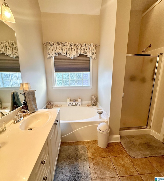 971 Old Cahaba Dr, Helena, AL 35080 - bathroom with a stall shower, a bath, vanity, and tile patterned floors