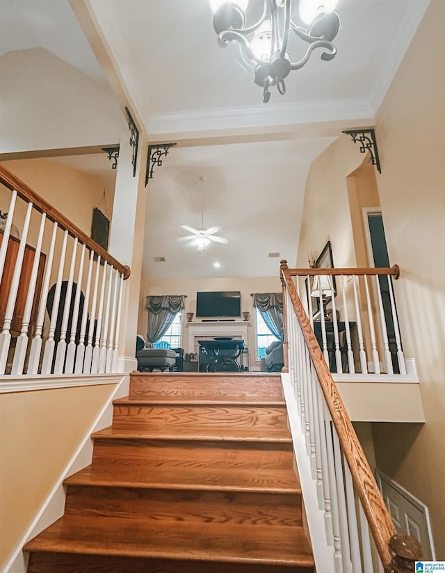 971 Old Cahaba Dr, Helena, AL 35080 - staircase with a chandelier, ceiling fan, crown molding, and a fireplace