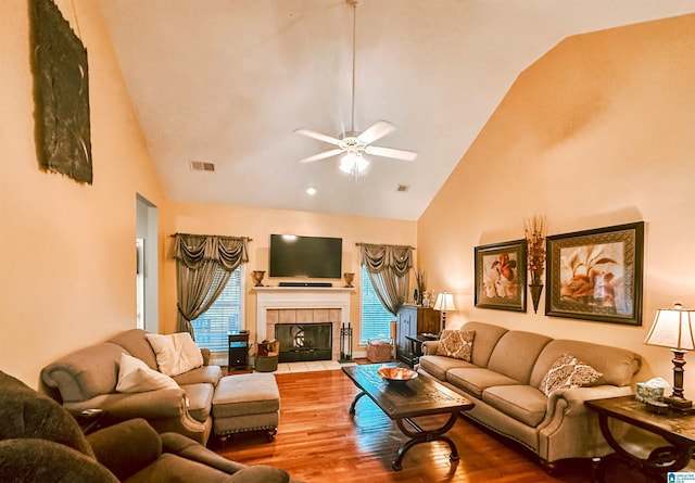 971 Old Cahaba Dr, Helena, AL 35080 - living area with high vaulted ceiling, wood finished floors, a ceiling fan, and a fireplace