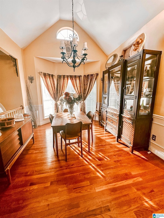 971 Old Cahaba Dr, Helena, AL 35080 - dining space featuring a chandelier, wood finished floors, wainscoting, and high vaulted ceiling