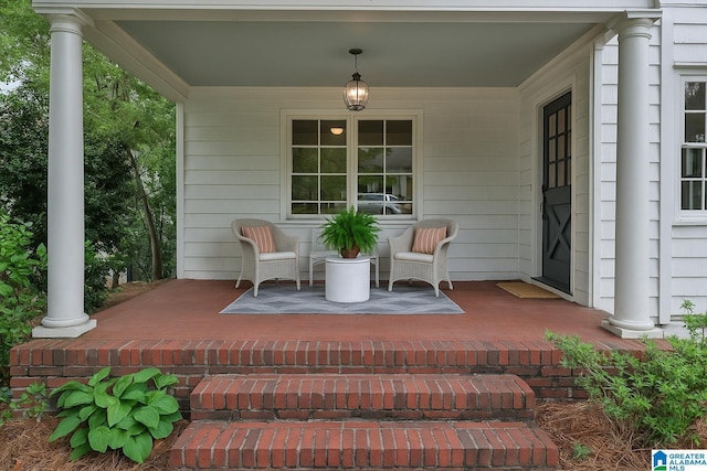 view of patio featuring a porch