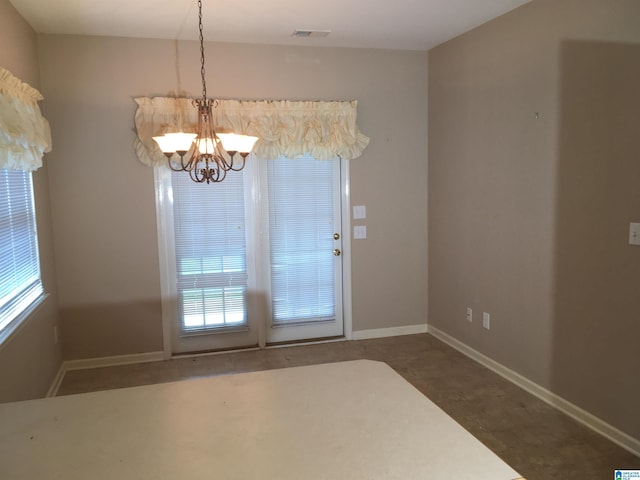 1037 Windsor Pkwy, Moody, AL 35004 - unfurnished dining area featuring a chandelier and baseboards
