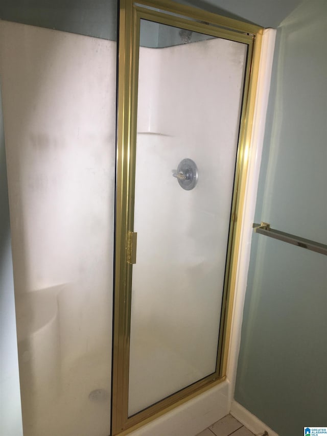 1037 Windsor Pkwy, Moody, AL 35004 - full bathroom featuring a stall shower and tile patterned floors