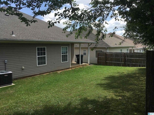 1037 Windsor Pkwy, Moody, AL 35004 - rear view of property with a shingled roof and central AC