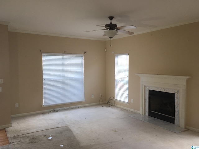 1037 Windsor Pkwy, Moody, AL 35004 - unfurnished living room featuring a premium fireplace, ornamental molding, ceiling fan, baseboards, and carpet floors