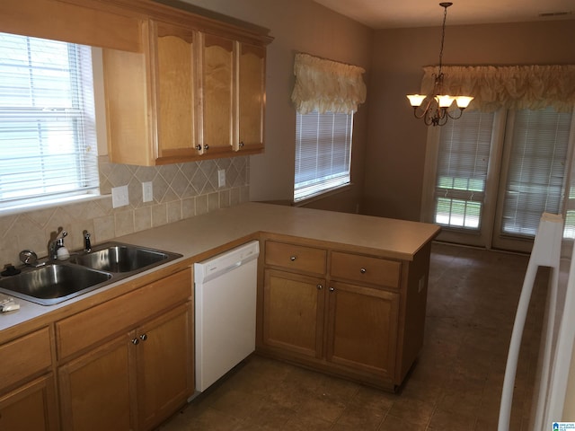 1037 Windsor Pkwy, Moody, AL 35004 - kitchen featuring dishwasher, a peninsula, a sink, and healthy amount of natural light