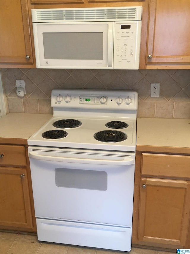 1037 Windsor Pkwy, Moody, AL 35004 - kitchen with white appliances, light countertops, and backsplash