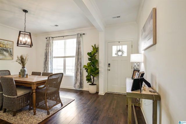 1064 Timberline Rdg, Calera, AL 35040 - foyer with an inviting chandelier, crown molding, dark wood-type flooring, and visible vents
