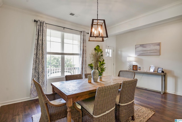 1064 Timberline Rdg, Calera, AL 35040 - dining space featuring wood finished floors, crown molding, visible vents, baseboards, and a chandelier