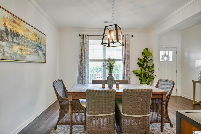 1064 Timberline Rdg, Calera, AL 35040 - dining room featuring an inviting chandelier, ornamental molding, dark wood-style floors, and visible vents