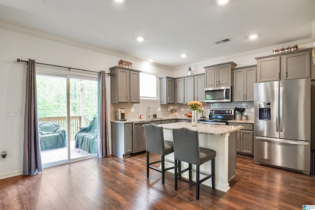 1064 Timberline Rdg, Calera, AL 35040 - kitchen featuring a sink, ornamental molding, visible vents, gray cabinetry, and appliances with stainless steel finishes