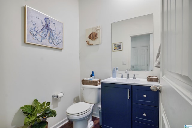 1064 Timberline Rdg, Calera, AL 35040 - half bath with vanity, toilet, and wood finished floors