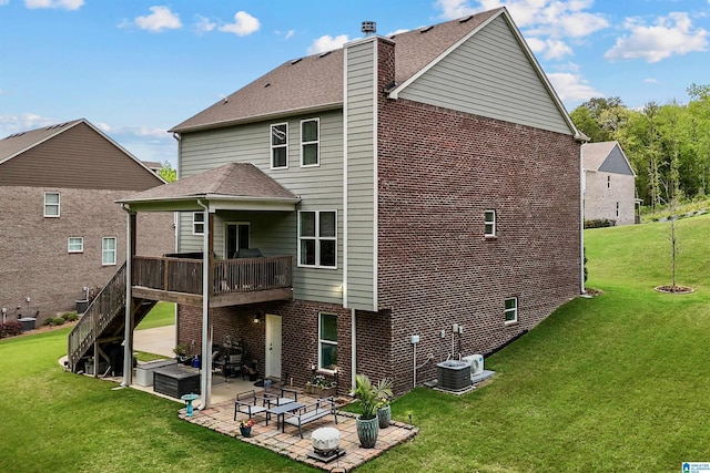 1064 Timberline Rdg, Calera, AL 35040 - rear view of property featuring a yard, a chimney, brick siding, a patio, and a wooden deck