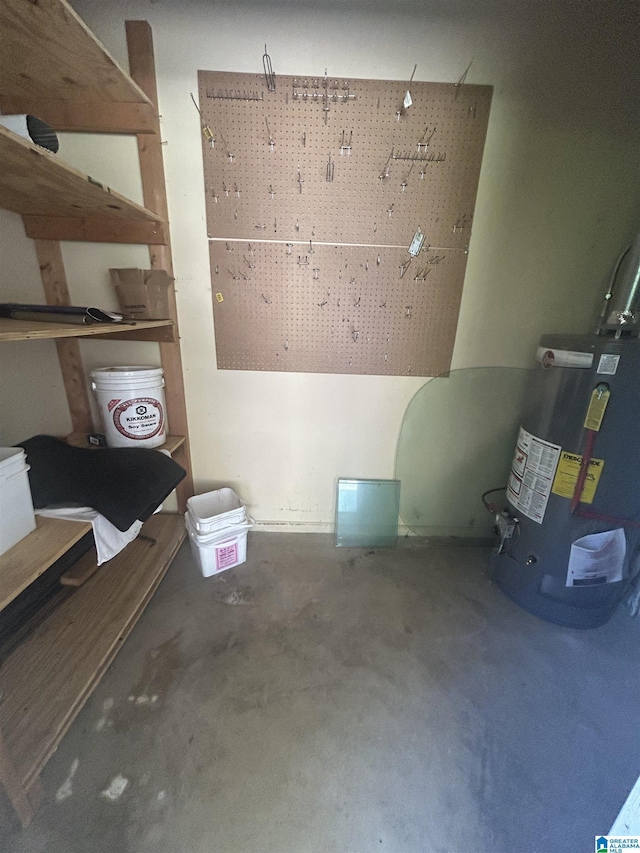 interior space featuring gas water heater and a workshop area