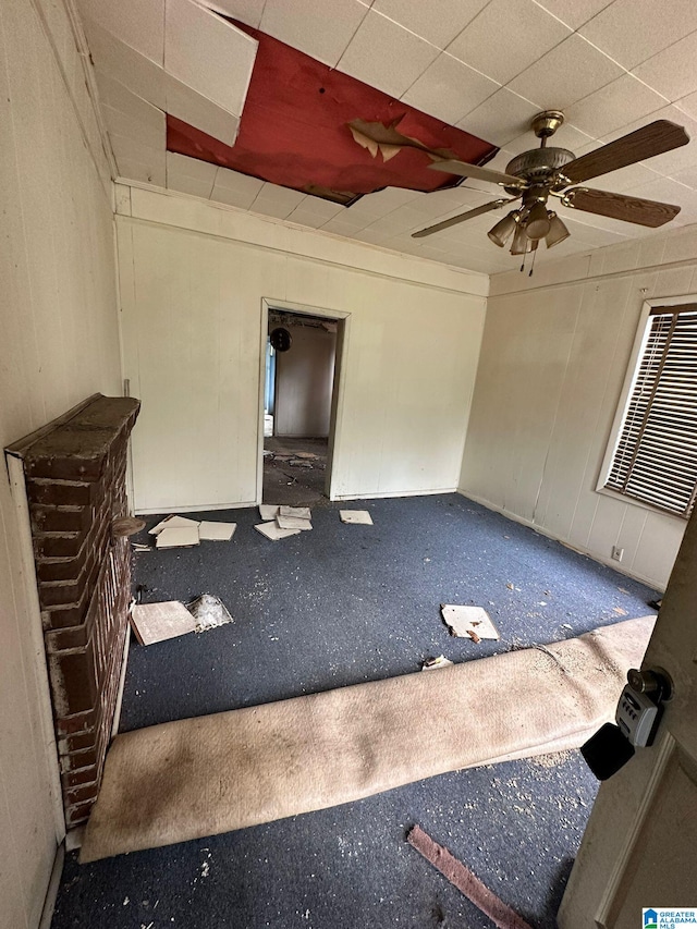 empty room featuring a ceiling fan and visible vents