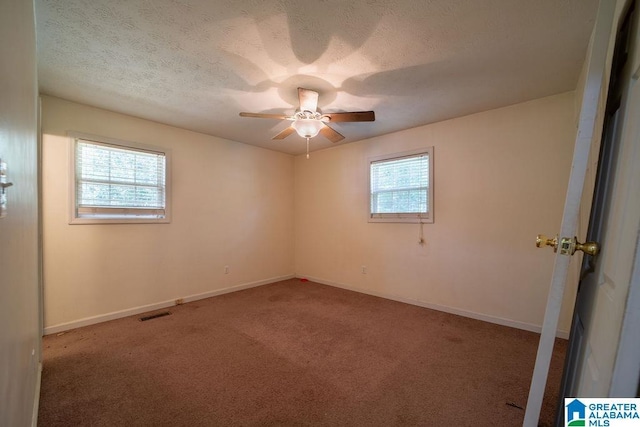 1009 Maxanna Dr, Anniston, AL 36206 - carpeted spare room with ceiling fan and baseboards