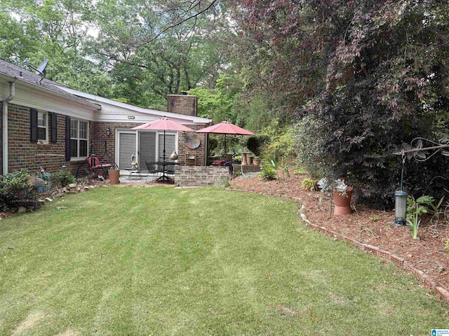view of yard featuring a patio